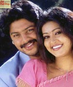 April madhathil 2002 Song Download